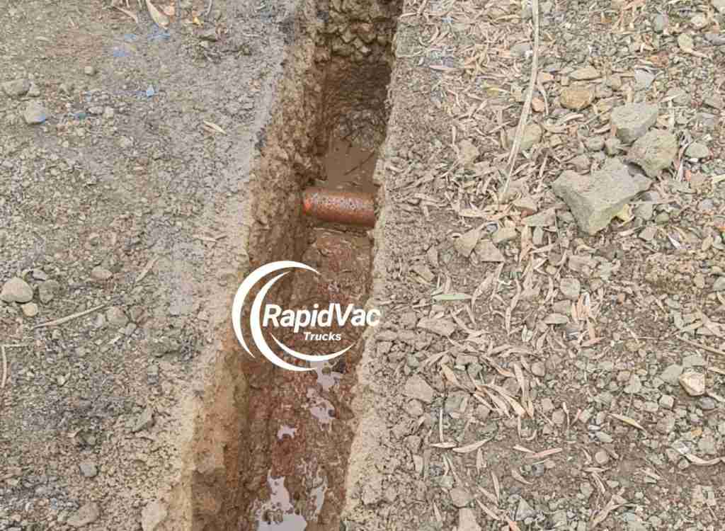 Hydro excavation trenching with minimal ground disturbance.